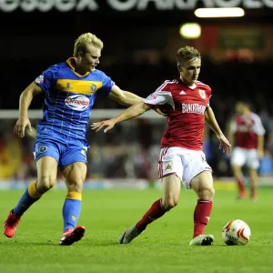 Bristol City's Joe Bryan Fends Off Opponent Print Bristol City's Joe Bryan Fends Off Opponent Print