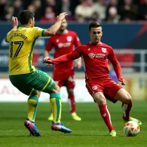Bristol City's Joe Bryan Outmuscles Norwich City's Yanic Wildschut for Ball Possession - Sky Bet Championship Clash at Ashton Gate