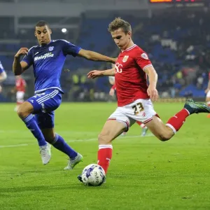 Bristol City's Joe Bryan Sending a Cross at Cardiff City Stadium, 2015