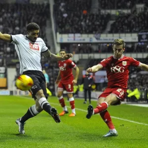 Bristol City's Joe Bryan Sends a Cross into the Derby County Box Bristol City's Joe Bryan Sends a Cross into the Derby County Box