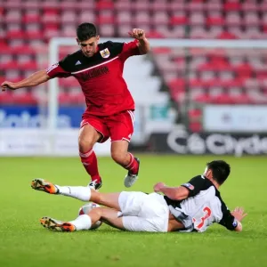 Bristol City's Joe Edwards Tackled in Pre-Season Friendly Against Dunfermline Athletic Bristol City's Joe Edwards Tackled in Pre-Season Friendly Against Dunfermline Athletic