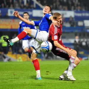 Bristol City's Jon Stead vs. Portsmouth's Joel Ward: Championship Clash at Fratton Park (September 2010)