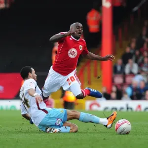 Bristol City's Kalifa Cisse Fouled by Burnley's Tyrone Mears in Championship Match, 2011 Bristol City's Kalifa Cisse Fouled by Burnley's Tyrone Mears in Championship Match, 2011