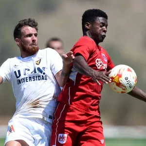 Bristol City's Kieran Agard Fights for Possession in Pre-season Friendly Against UCAM Bristol City's Kieran Agard Fights for Possession in Pre-season Friendly Against UCAM