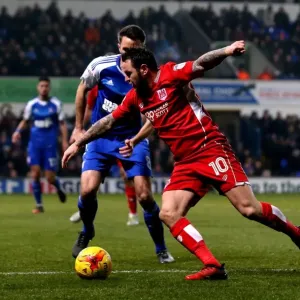 Bristol City's Lee Tomlin Faces Off Against Ipswich Town's Cole Skuse in Championship Clash