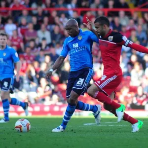 Bristol City's Liam Fontaine Chases Down El-Hadji Diouf