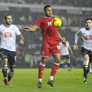 Bristol City's Liam Moore Battles for Control in Derby County Showdown Bristol City's Liam Moore Battles for Control in Derby County Showdown