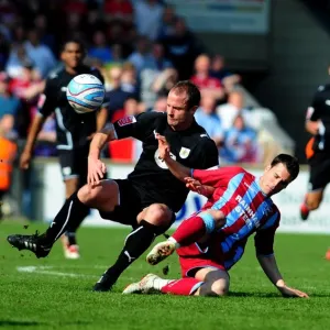 Bristol City's Louis Carey Clashes with Cliff Byrne of Scunthorpe United in Championship Battle, 17th April 2010 Bristol City's Louis Carey Clashes with Cliff Byrne of Scunthorpe United in Championship Battle, 17th April 2010