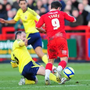 Bristol City's Louis Carey Tackles Matt Tubbs of Crawley Town in FA Cup Clash - 07/01/2012