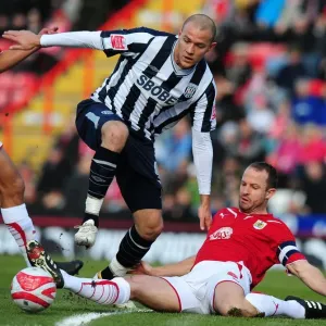 Bristol City's Louis Carey Tackles West Bromwich Albion's Roman Bednal - Football Championship Clash, 2010