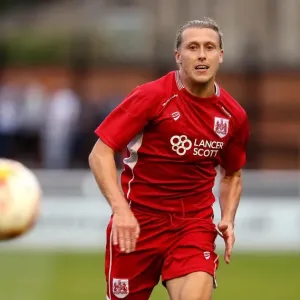 Bristol City's Luke Freeman Chases Down the Ball in Pre-Season Friendly Against Bath City Bristol City's Luke Freeman Chases Down the Ball in Pre-Season Friendly Against Bath City