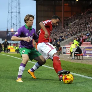 Bristol City's Luke Freeman Chases Down Swindon Town's Nathan Byrne in Sky Bet League One Clash