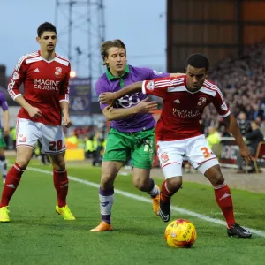 Bristol City's Luke Freeman Closes In on Swindon Town's Nathan Byrne during Sky Bet League One Match