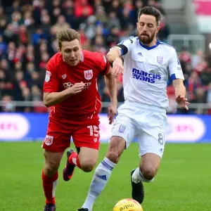 Bristol City's Luke Freeman Outmaneuvers Ipswich Town's Cole Skuse During Championship Clash at Ashton Gate Bristol City's Luke Freeman Outmaneuvers Ipswich Town's Cole Skuse During Championship Clash at Ashton Gate