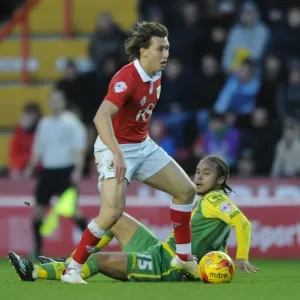 Bristol City's Luke Freeman Outmaneuvers Notts County's Curtis Thompson during Sky Bet League One Clash at Ashton Gate Bristol City's Luke Freeman Outmaneuvers Notts County's Curtis Thompson during Sky Bet League One Clash at Ashton Gate