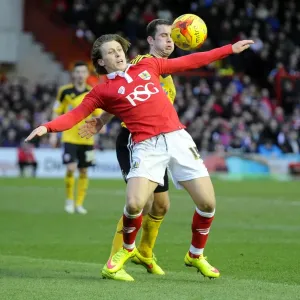 Bristol City's Luke Freeman Shields Off Michael Doyle's Challenge during Bristol City vs Sheffield United