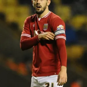 Bristol City's Marlon Pack Adjusts Arm Band at Molineux Stadium during Wolves vs. Bristol City, Sky Bet Championship (March 8, 2016)