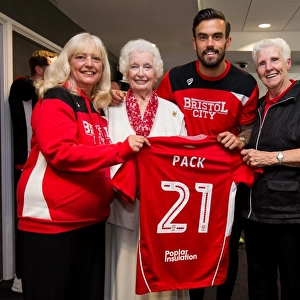 Bristol City's Marlon Pack Presents Sponsors Signed Shirt after Championship Match vs. Birmingham City