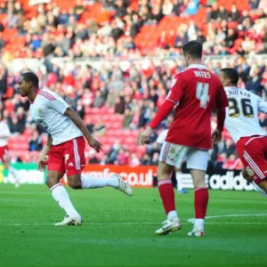 Bristol citys Marvin elliott celebrates with team mates after scoring the winning goal