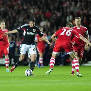 Bristol City's McLaughlin Charges Past Hooiveld in Southampton Showdown