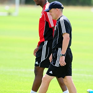 Bristol Citys new signing Kalifa Cisse with Bristol City Manager, Steve Coppell