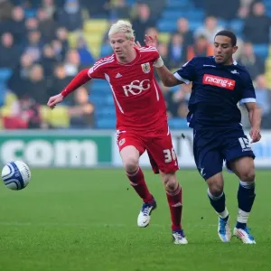 Bristol City's Ryan McGivern vs. Liam Feeney: Battle for the Ball in Millwall vs. Bristol City Championship Match, 2011 Bristol City's Ryan McGivern vs. Liam Feeney: Battle for the Ball in Millwall vs. Bristol City Championship Match, 2011