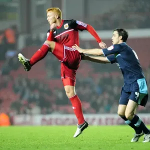 Bristol City's Ryan Taylor beats Burnley's Michael Duff to the ball - Print Bristol City's Ryan Taylor beats Burnley's Michael Duff to the ball - Print
