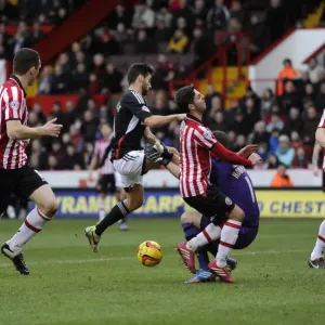 Bristol City's Sam Baldock Clashes with Sheffield United's Mark Howard - Football Rivalry at Bramall Lane (February 2014) Bristol City's Sam Baldock Clashes with Sheffield United's Mark Howard - Football Rivalry at Bramall Lane (February 2014)