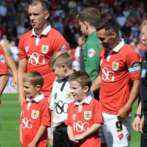 Bristol City's Sam Baldock Meets Mascots During Sky Bet League One Clash Against Colchester United Bristol City's Sam Baldock Meets Mascots During Sky Bet League One Clash Against Colchester United