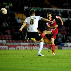 Print of Bristol City's Sam Baldock shooting over the goal
