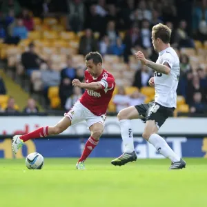 Bristol City's Sam Baldock Slices Through Port Vale Defense in Sky Bet League 1 Clash