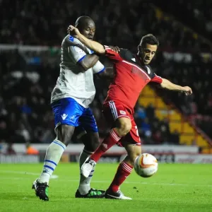 Bristol City's Sam Baldock vs Millwall's Danny Shittu Print
