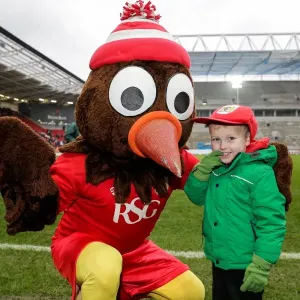 Bristol City's Scrumpy Mascot Surprises Young Fan with Cap at Half-Time Bristol City's Scrumpy Mascot Surprises Young Fan with Cap at Half-Time