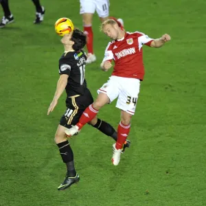 Bristol City's Simon Gillett and Crawley Town's Josh Simpson Battle for High Ball in Cardiff City vs Swansea City Match Bristol City's Simon Gillett and Crawley Town's Josh Simpson Battle for High Ball in Cardiff City vs Swansea City Match