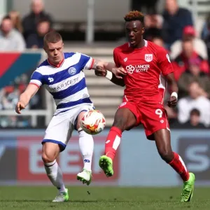 Bristol City's Tammy Abraham Slips Past QPR's Jake Bidwell in Championship Clash