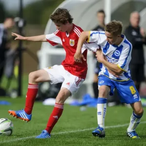 Bristol City's Tom Fry Battles Past Brighton's Cameron Wiltshire in U18 Football Clash