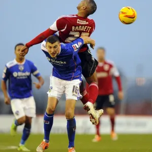 Bristol City's Tyrone Barnett Fights for Ball Against Oldham Athletic's James Wilson in Sky Bet League One Clash Bristol City's Tyrone Barnett Fights for Ball Against Oldham Athletic's James Wilson in Sky Bet League One Clash