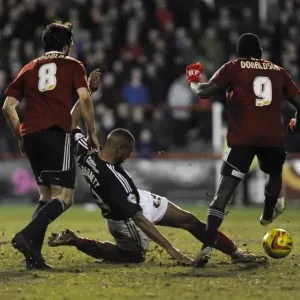 Bristol City's Tyrone Barnett vs. Brentford's Clayton Donaldson - Intense Football Rivalry at Griffin Park (January 2014) Bristol City's Tyrone Barnett vs. Brentford's Clayton Donaldson - Intense Football Rivalry at Griffin Park (January 2014)