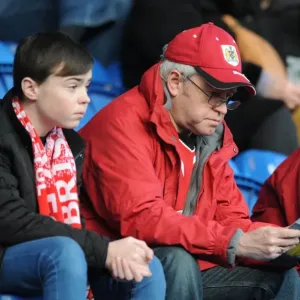Bristol City's Unwavering Support: Sky Bet League One Battle at Colchester United (February 2015) Bristol City's Unwavering Support: Sky Bet League One Battle at Colchester United (February 2015)