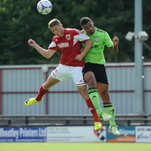 Bristol City's Wes Burns and Forest Green Rovers Jamie Turley Battle for High Ball in Preseason Clash Bristol City's Wes Burns and Forest Green Rovers Jamie Turley Battle for High Ball in Preseason Clash