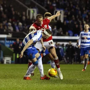 Bristol City's Wilbraham Fights for Possession against Reading Defenders in Sky Bet Championship Match, 2016