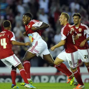 El partido de derrota del derby de Brisol entre el Bristol City y el Bristol Rovers en la competición Johnstones Paint Trophy del año 2013 fue un golazo impresionante por parte de Jay Emmanuel-Thomas