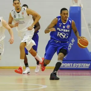 Bristol Flyers Doug Herring Drives Forward in Basketball Action Against Plymouth Raiders Bristol Flyers Doug Herring Drives Forward in Basketball Action Against Plymouth Raiders