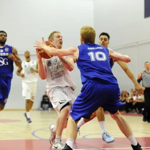 Bristol Flyers Mathias Seilund Stops Plymouth Raiders Josh Wilcher in Basketball Action Bristol Flyers Mathias Seilund Stops Plymouth Raiders Josh Wilcher in Basketball Action
