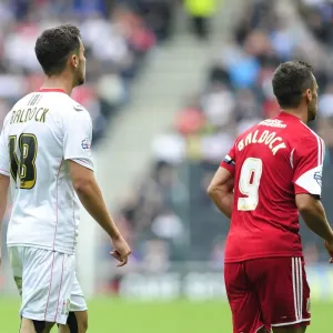 Brothers in Action: Sam and George Baldock Face Off in Milton Keynes Dons vs. Bristol City Clash