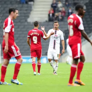 Brothers in Football: Sam and George Baldock Celebrate Together After Milton Keynes Dons vs. Bristol City