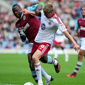 Burnley's Andre Bikey Fouls Jon Stead: Championship Clash Between Burnley and Bristol City, September 2010 Burnley's Andre Bikey Fouls Jon Stead: Championship Clash Between Burnley and Bristol City, September 2010