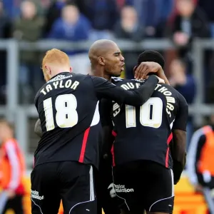 Celebrating Glory: Jay Emmanuel-Thomas, Marvin Elliott, and Ryan Taylor's Unforgettable Moment after Scoring for Bristol City against Carlisle United (26th October 2013) Celebrating Glory: Jay Emmanuel-Thomas, Marvin Elliott, and Ryan Taylor's Unforgettable Moment after Scoring for Bristol City against Carlisle United (26th October 2013)