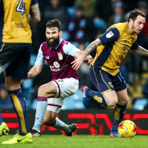 Challenge at Villa Park Print: Lee Tomlin vs Mile Jedinak