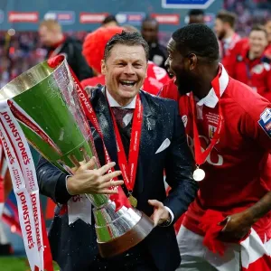 Champagne Moment: Steve Cotterill and Jay Emmanuel-Thomas Celebrate Bristol City's JPT Win